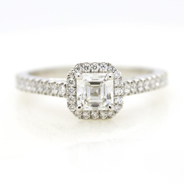 asscher cut diamond with diamond halo engagement ring