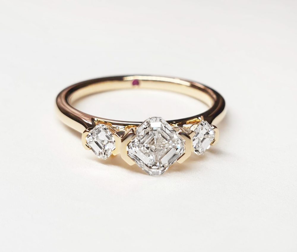 Asscher trilogy in yellow gold