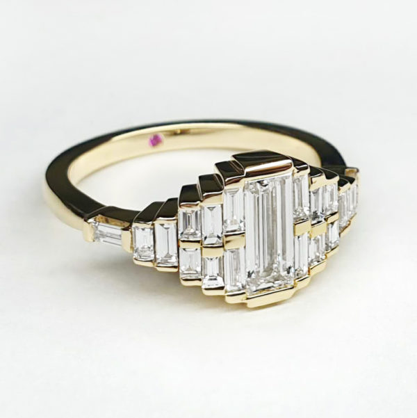 Baguette cut diamond cluster engagement set in yellow gold