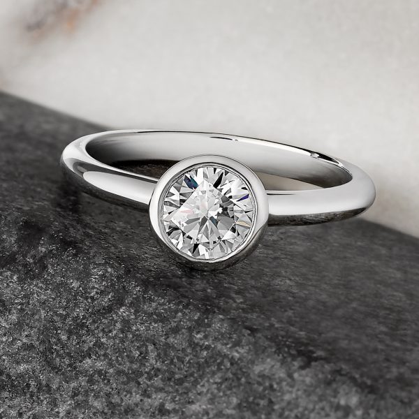 bezel set round diamond engagement ring