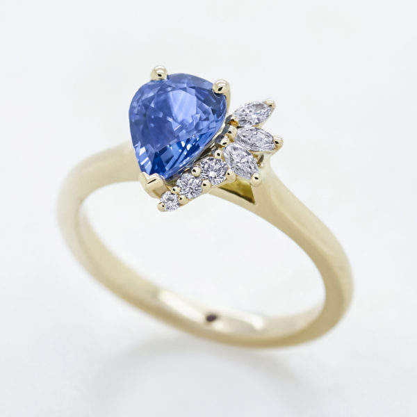 Taylor & Hart blue pear sapphire pear diamond side yellow gold band