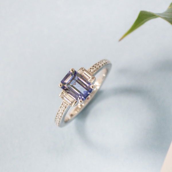 Emerald cut blue sapphire engagement ring