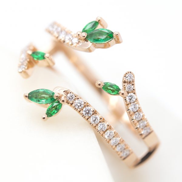 custom organic inspired wedding ring with marquise emeralds