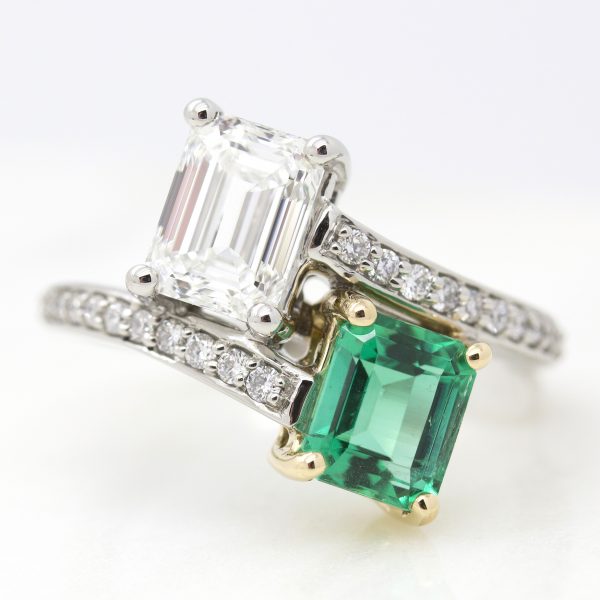 emerald cut emerald and diamond moi et toi engagement ring