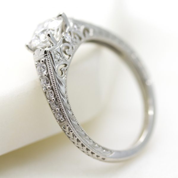 engagement ring with bead-set diamonds, filigree, hand engraving and milgrain