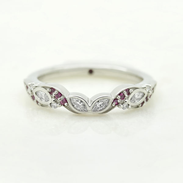Vintage floral inspired wedding band with diamonds and rubies