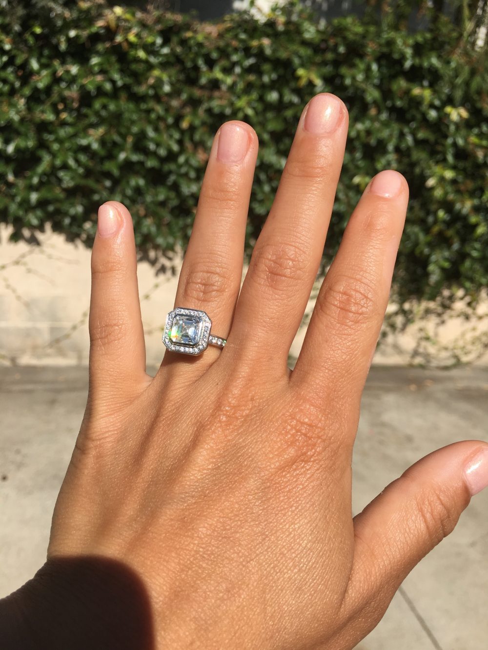 asscher cut diamond halo engagement ring