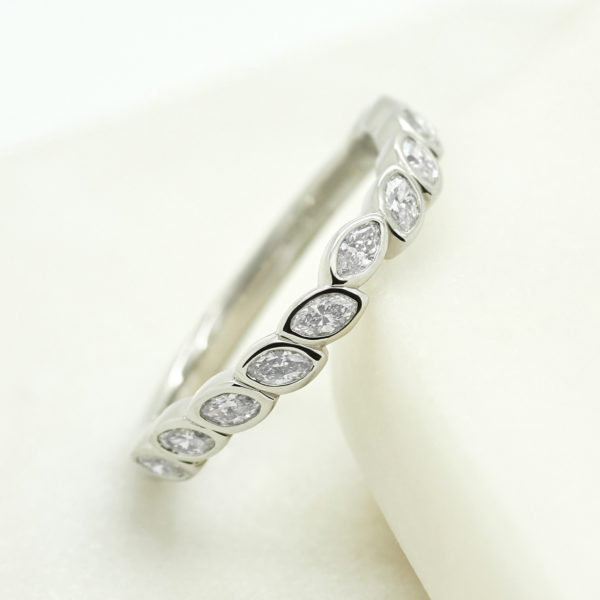 Vintage platinum wedding band with marquise diamonds
