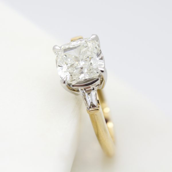 mixed metal engagement ring with yellow gold and platinum