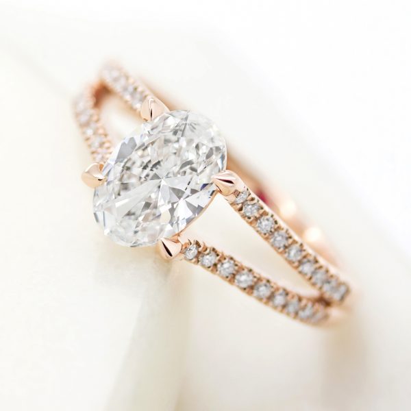 oval diamond engagement ring with split shank rose gold pave diamond band