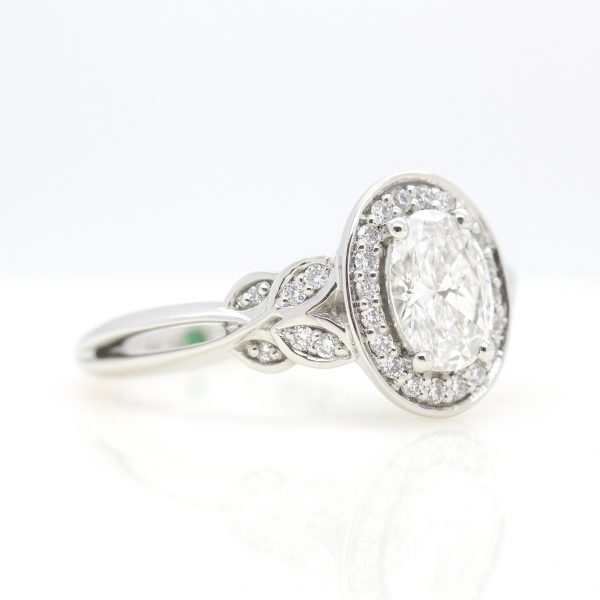 oval diamond halo with side stones inspired by leaves