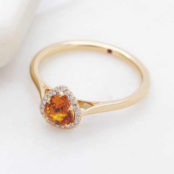 Taylor and Hart pear shaped orange sapphire yellow gold band solitare