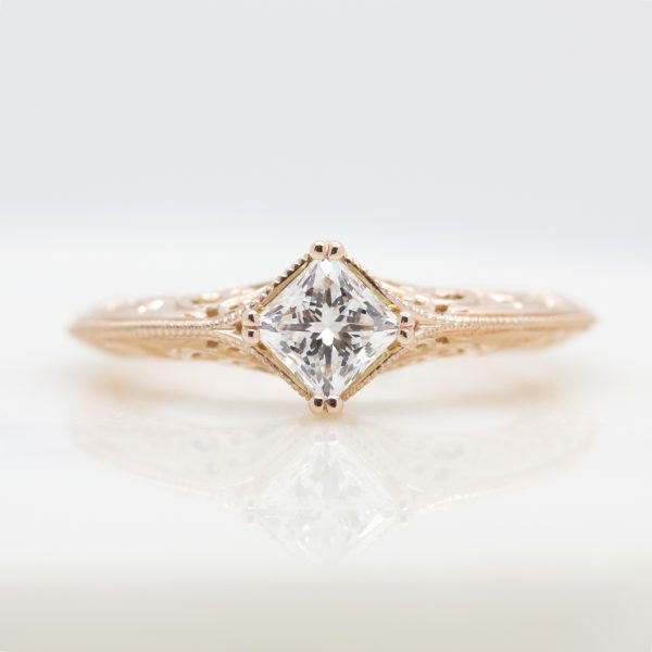 princess cut diamond engagement ring with filigree and milgrain detail