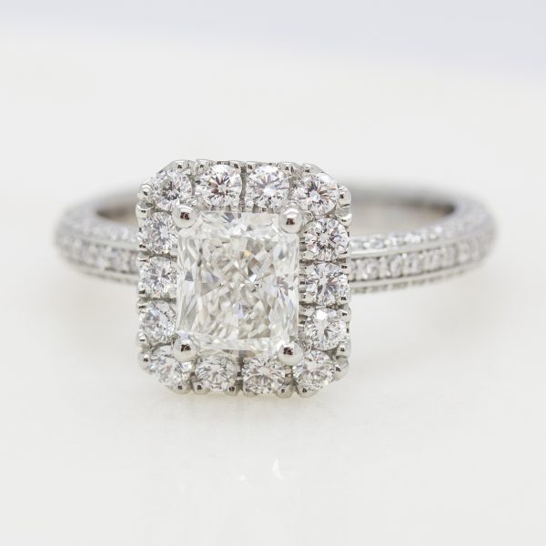 radiant diamond center with diamond halo and three sided diamond pave engagement ring