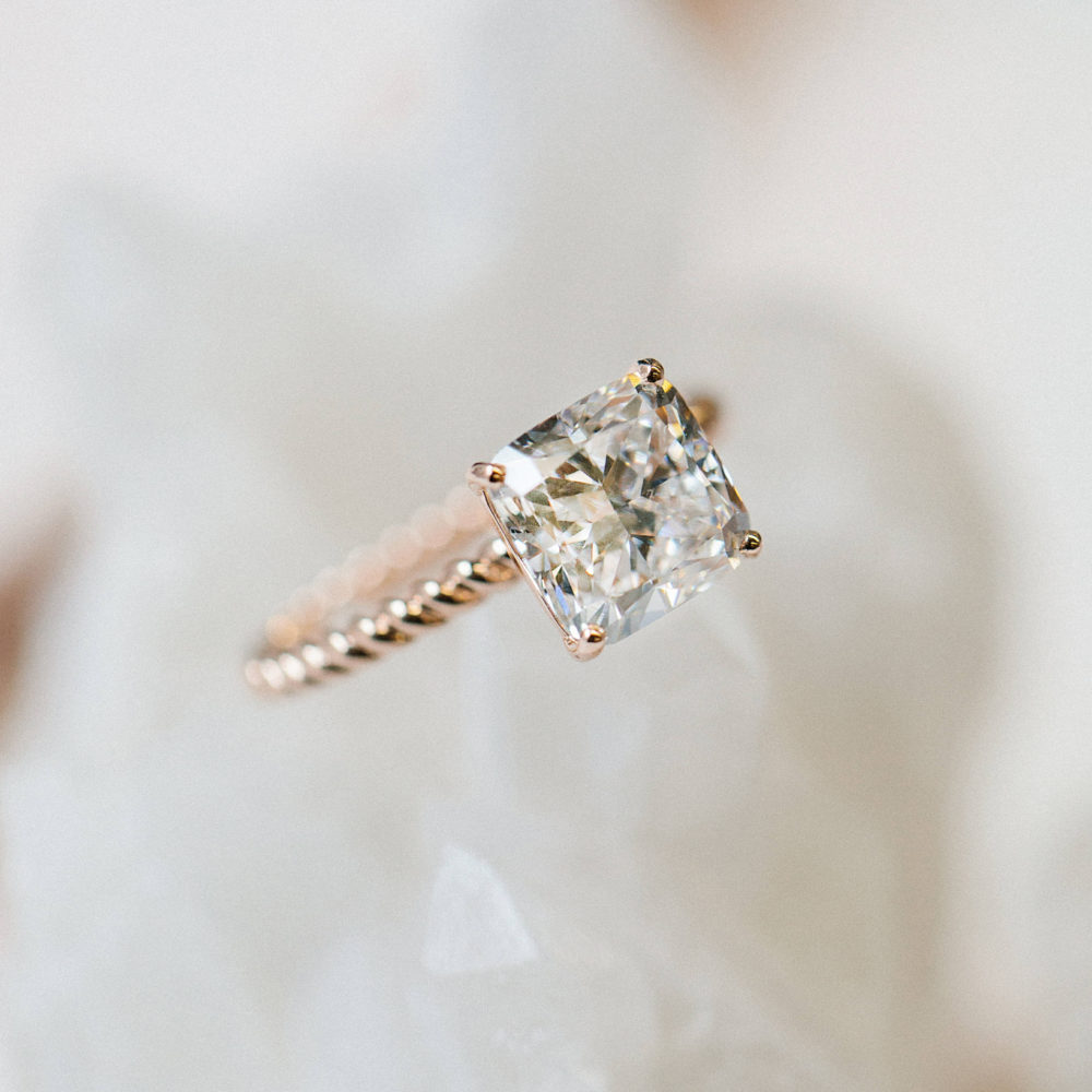 Rose gold rope band with cushion cut diamond