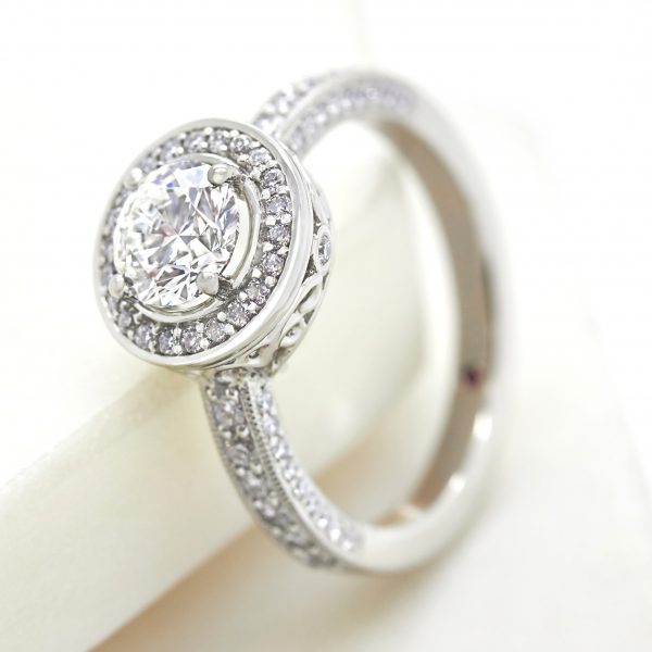round diamond halo engagement ring with filigree undergallery collet