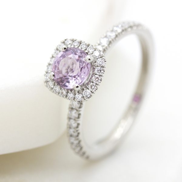 round pink sapphire with diamond halo engagement ring