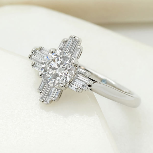 Vintage round diamond platinum engagement ring with