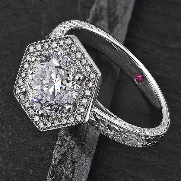 ruby set inside of band hexagon engagement ring