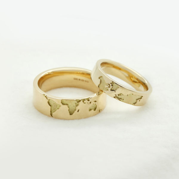 yellow gold world map wedding rings